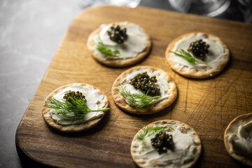 caviar on cracker with cream cheese