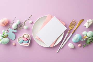 Easter concept. Top view photo of pink envelope and paper card in plate fork knife easter bouquets pink and blue eggs saucer with sweets and ceramic bunny on isolated lilac background with empty space