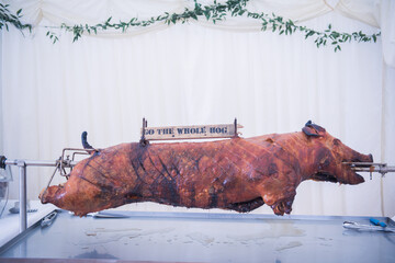 Whole hog roast on a spit © zoerae28