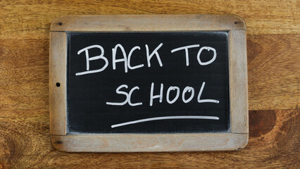 the words slate with written on it Back to school