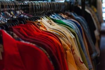 colorful shirts on hangers