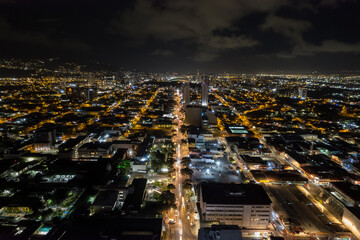 Fototapeta premium Beautiful aeria view of the city of San Jose Costa Rica at Night, full of lights