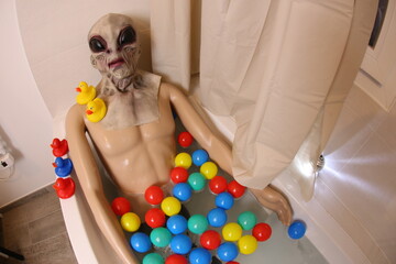 Spooky alien in the bathtub