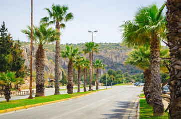 Fototapeta premium Beautiful highway with palms in Athens, Greece.