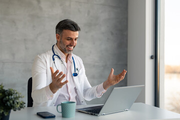 Virtual healthcare consultations with positive doctor. Medical video call and online help for checkup, test and advice from a friendly trusted doctor. Hospital worker talking with patient online.