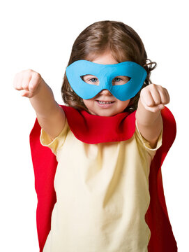 Little child Superhero. In mask and cloak