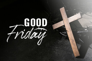 Wooden cross, crown of thorns and text GOOD FRIDAY on dark background