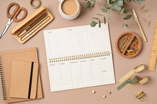 Mockup of  weekly planner and office stationery with copy space for text. Flat lay, top view photo mock up.