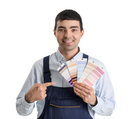 Male painter pointing at color palettes on white background