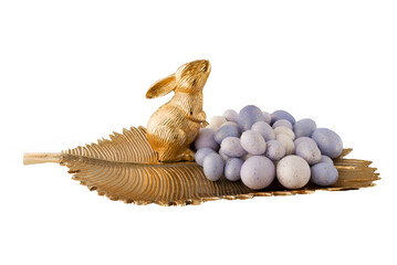 gold Easter bunny rabbit on background with Easter eggs