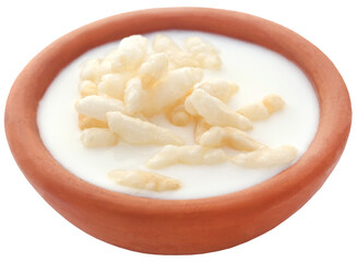Fresh milk in a clay pottery with puffed rice