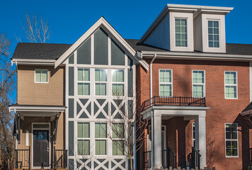 Obraz premium New residential townhouses. Modern apartment buildings in BC Canada. Modern complex of apartment buildings