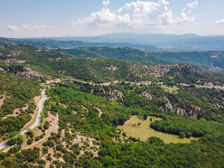 Fototapeta na wymiar Aerial vIew The Holy Meteora Monasteries by drone. Summer Greece. Kalampaka. Kalabaka.