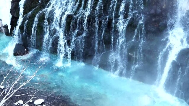 Hokkaido,Japan - February 26, 2023: Frozen Shirahige falls or Shirahige-no-taki Falls in Biei, Hokkaido, Japan
