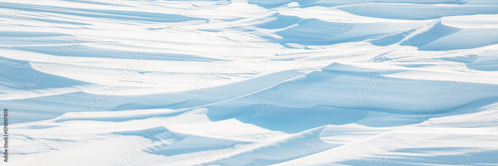 Sticker snow texture. wind sculpted patterns on snow surface. wind in the tundra and in the mountains on the