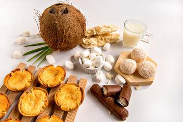 Coconut delights on a white background, coconut candy, baijinho and cocada