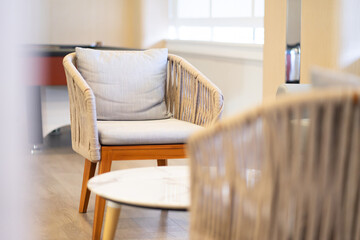 A minimalist gray soft chair in a space to relax on a casual day