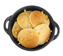 Tasty corn pancakes in frying pan isolated on white, top view