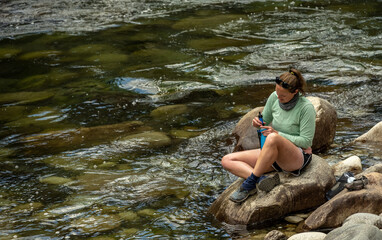 Woman Filters Drinking Water out of the Tuolumne River