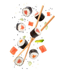 Sushi rolls and wooden chopsticks flying on white background © New Africa