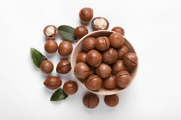 Delicious organic Macadamia nuts on white background, flat lay