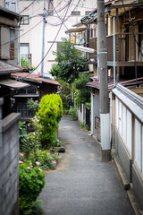 Narrow streets of Tokyo downtown (Shitamachi) with small shops and homes