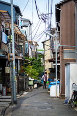 Narrow streets of Tokyo downtown (Shitamachi) with small shops and homes