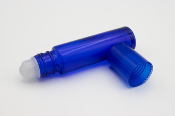 Empty blue roll on bottle