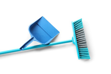 Blue dustpan and broom on white background