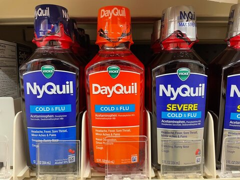Grocery store NyQuil cold and flu medicine variety