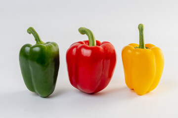 three bell peppers isolated on white background