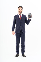 A man in a suit with a calculator