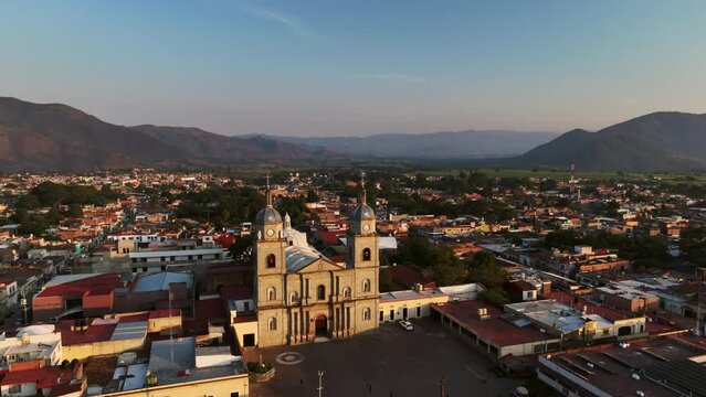 Peaceful View Of Tuxpan Urban Landscape With The Parish Church In Jalisco, Mexico. Aerial Shot
