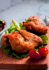 Chicken wings with vegetables