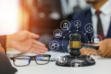 judge on wooden table And experienced lawyers meet with clients and give advice behind the scenes. legal services legal consulting concept