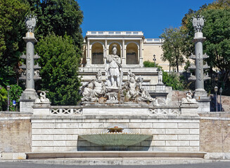 Fototapeta na wymiar Fountain of the goddess of Rome at the foot of the Pincio Gardens, at Peoples Square, Piazza del Popolo in Rome, Italy