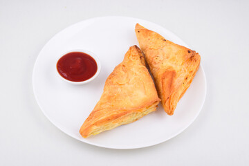 Potato Patties served with ketchup in plate isolated on white background