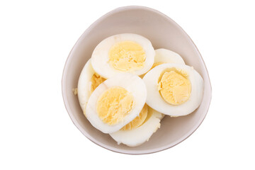 Sliced boil egg in bowl isolated on white background with clipping path