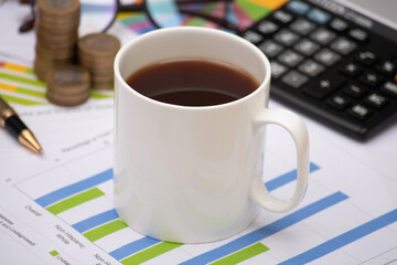 Closeup of coffee mug at office table