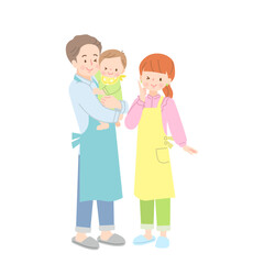 赤ちゃんを抱っこしたパパと笑顔のママ