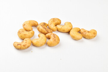 Spicy roasted cashew on white background