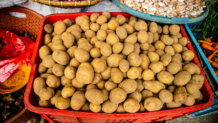 pile of potatoes sold in a traditional market