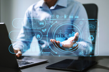 Businesswoman working virtual tablet computer twith reduce CO2 concept with icons, global warming such as reforest green factory recycle in office..