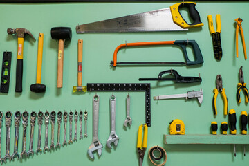  Handyman tool kit hanging in Garage at home,Various repair tools.