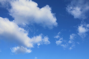 White clouds  and a blue sky. Cloudscape.