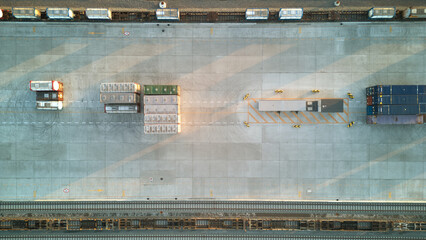 Aerial top down view of containers on cargo train terminal. Cargo train with freight train container, Business import export logistic and transportation railway.