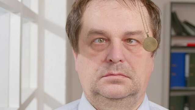 Portrait of man falls asleep in hypnosis session. 