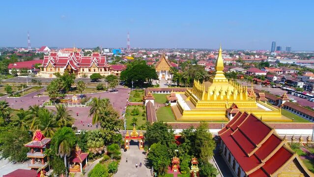 aerial vientiane laos capitol temple palace flying view drone footage pha that luan 