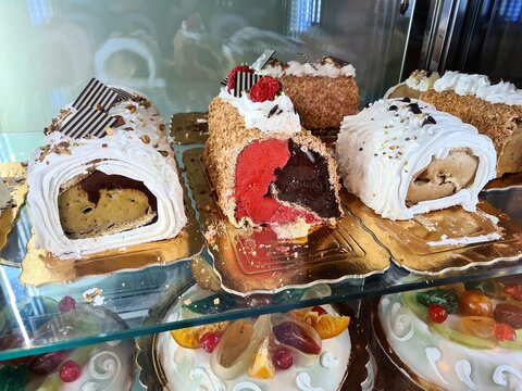 evocative image of typical Sicilian pastry cakes and ice creams
in an ice cream shop window