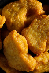 Concept of tasty fast or junk food, nuggets